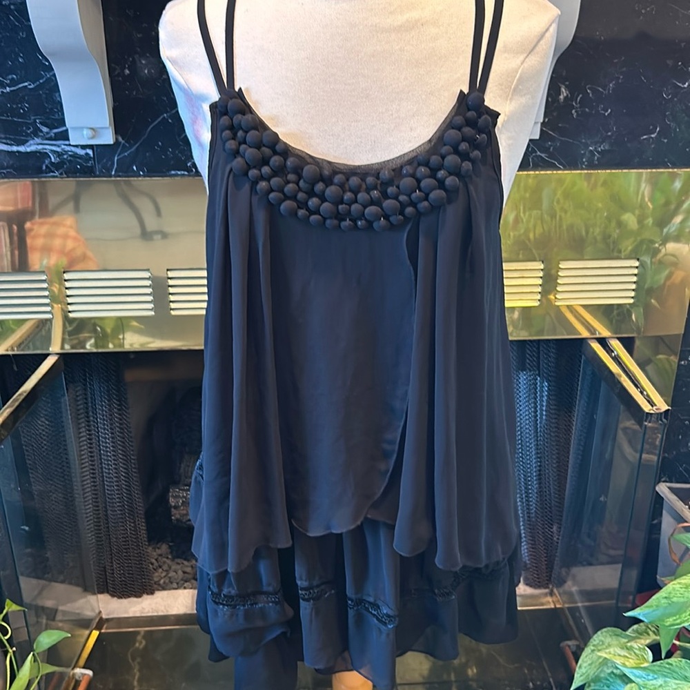 Long sheared layered top